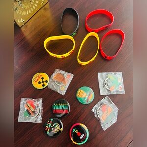 Lot of 14 Kwanzaa and black history, keychains, pens, and bracelets